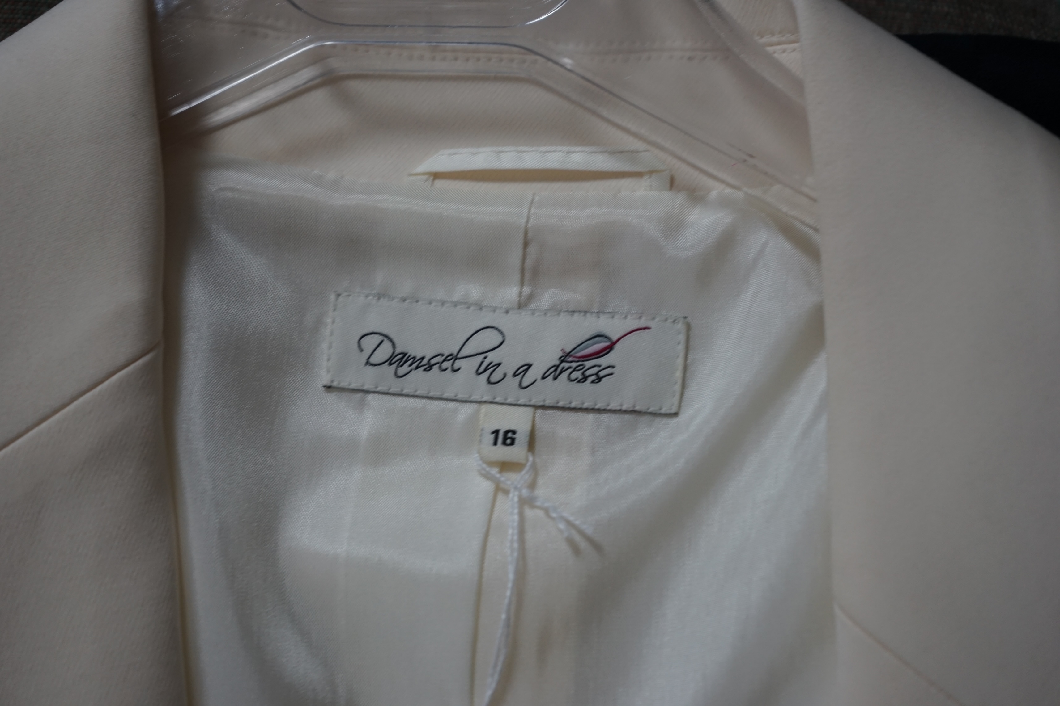 A selection of lady's jackets and two camisoles. Proceeds to Happy Paws Puppy Rescue